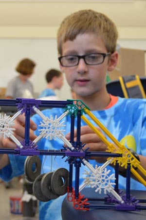 Boy building bridge